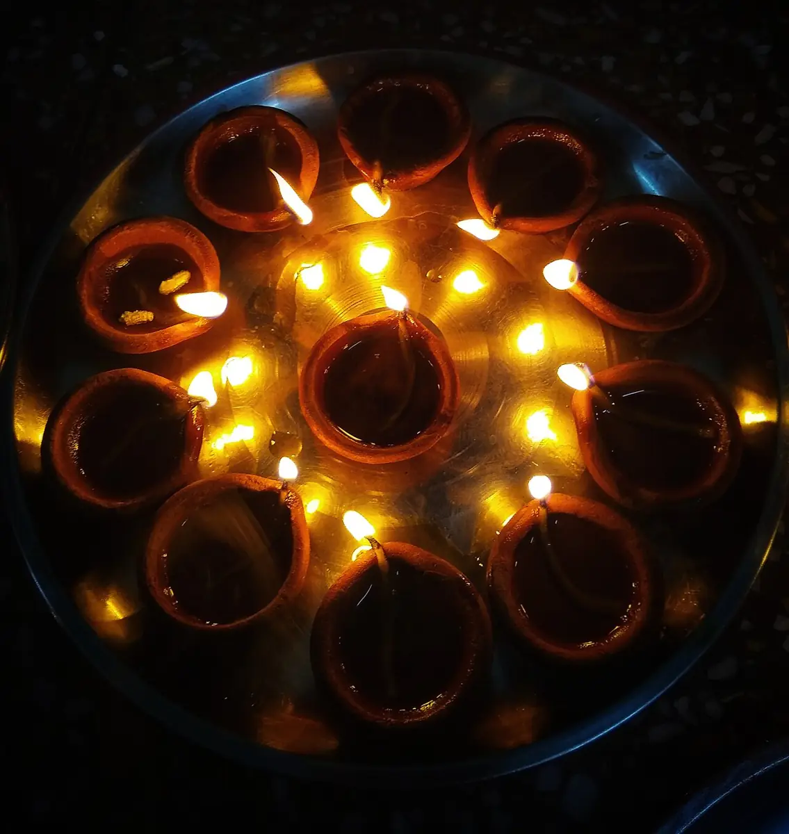 Clay diyas lit for Diwali.