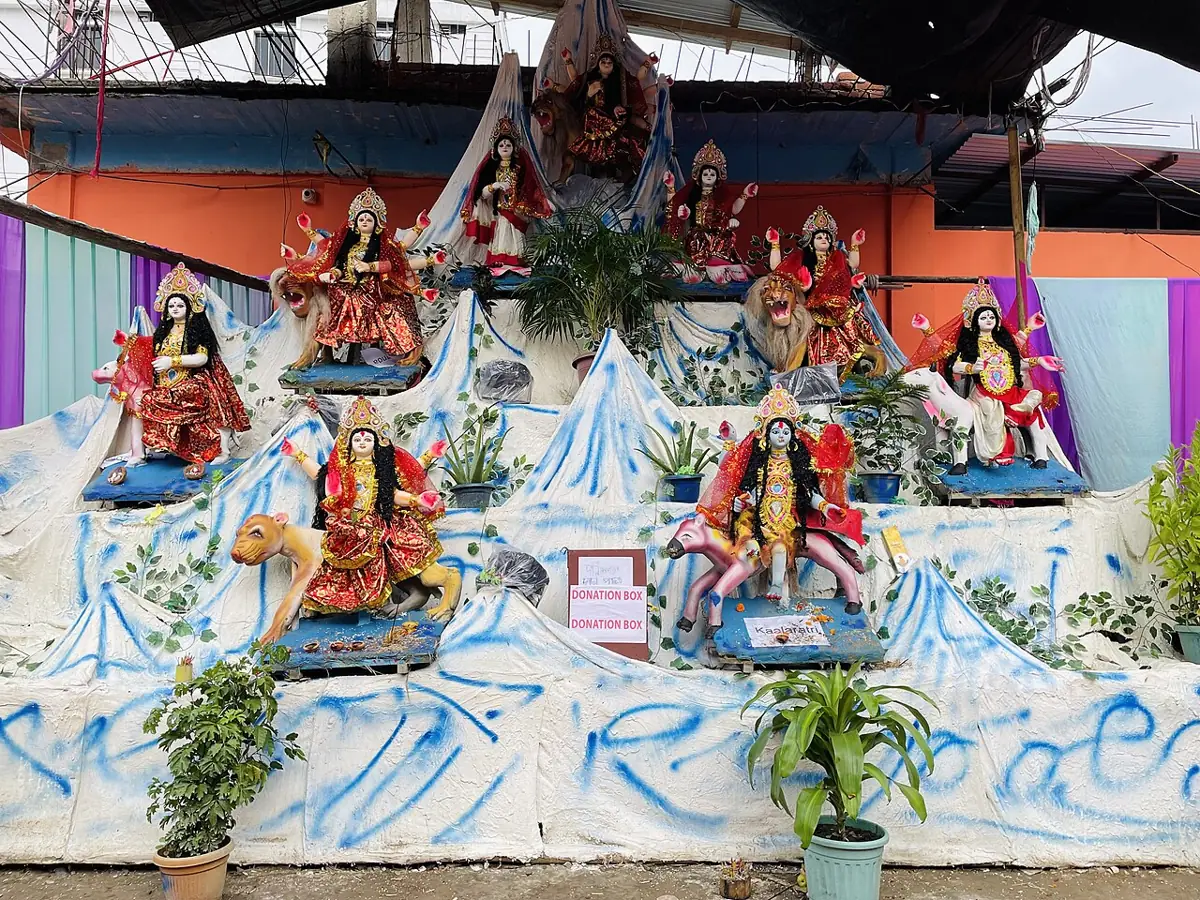 The nine forms of Durga, the Navadurga, at a Durga Puja pandal.